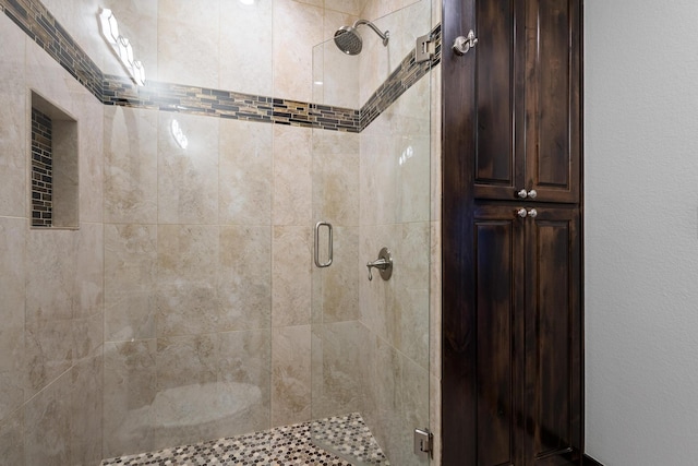 bathroom with a stall shower