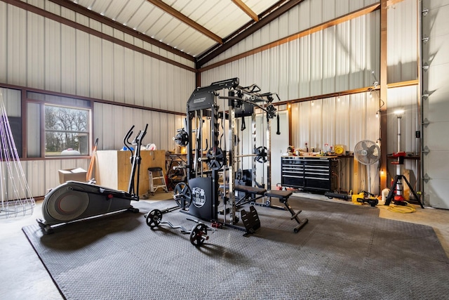 exercise room with a workshop area and metal wall