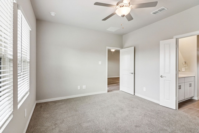 718 Caraway Dr, Princeton, TX 75071 - unfurnished bedroom with multiple windows, light colored carpet, and baseboards