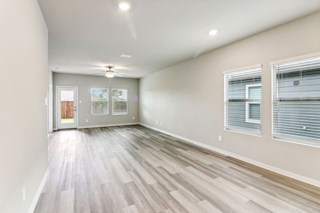 718 Caraway Dr, Princeton, TX 75071 - unfurnished room with light wood-type flooring, a ceiling fan, baseboards, and recessed lighting