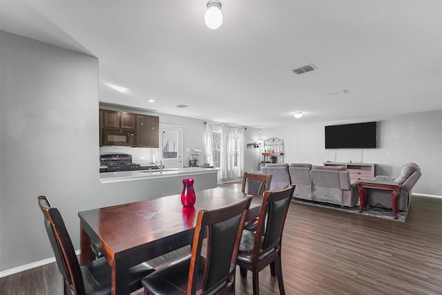 5625 Mcclelland St, Forney, TX 75126 - dining area featuring dark wood-style flooring, baseboards, and recessed lighting