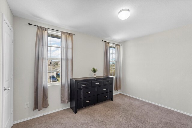 5625 Mcclelland St, Forney, TX 75126 - bedroom featuring light carpet and baseboards