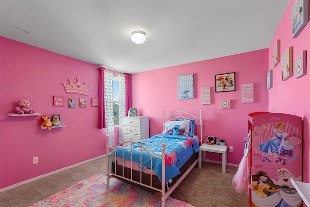 5625 Mcclelland St, Forney, TX 75126 - carpeted bedroom featuring a textured ceiling and baseboards