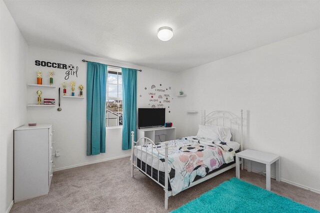 5625 Mcclelland St, Forney, TX 75126 - carpeted bedroom with baseboards