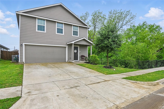 5625 Mcclelland St, Forney, TX 75126 - view of front of home with an attached garage, driveway, and cooling unit