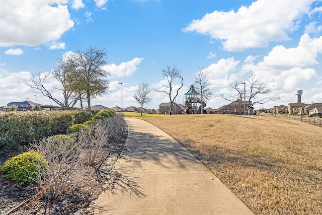 5625 Mcclelland St, Forney, TX 75126 - view of concrete driveway featuring a residential view