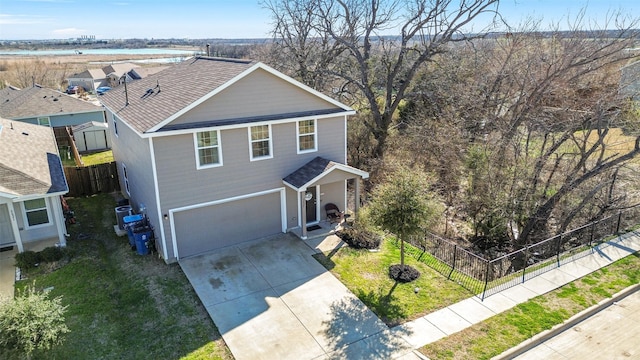 5625 Mcclelland St, Forney, TX 75126 - traditional-style house featuring an attached garage, driveway, and a shingled roof