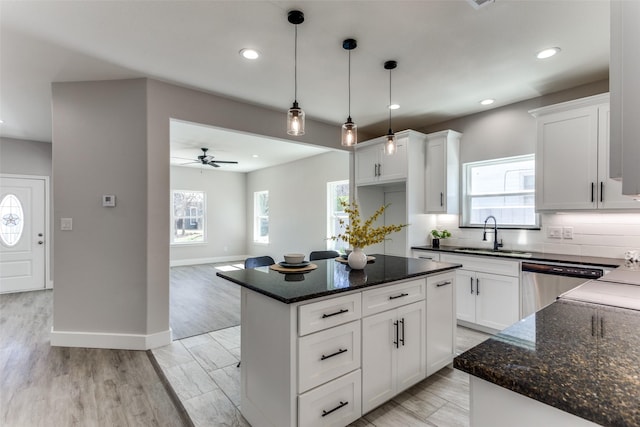 unfurnished living room featuring recessed lighting, wood finished floors, and ceiling fan