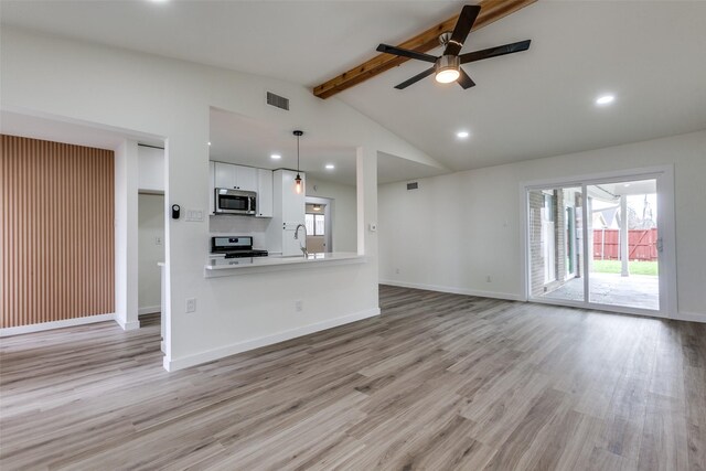 8212 Greenhollow Ln, Dallas, TX 75240 - kitchen with stainless steel appliances, baseboards, a sink, wood finished floors, and recessed lighting