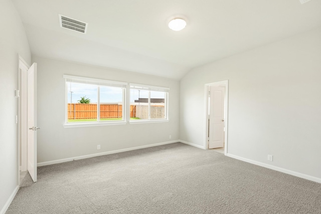 3255 Blossom Trl, Crandall, TX 75114 - carpeted empty room with baseboards and vaulted ceiling