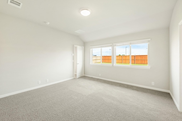 3255 Blossom Trl, Crandall, TX 75114 - unfurnished room with vaulted ceiling, baseboards, and carpet flooring