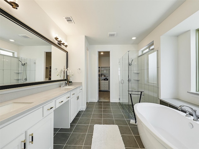 3141 Sunfish St, Prosper, TX 75078 - full bath with a freestanding tub, visible vents, a sink, and a shower stall