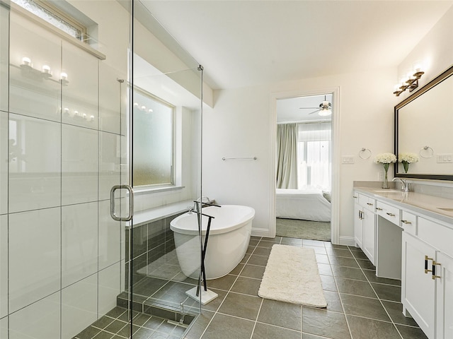 3141 Sunfish St, Prosper, TX 75078 - bathroom with a stall shower, vanity, a soaking tub, ensuite bath, and tile patterned flooring