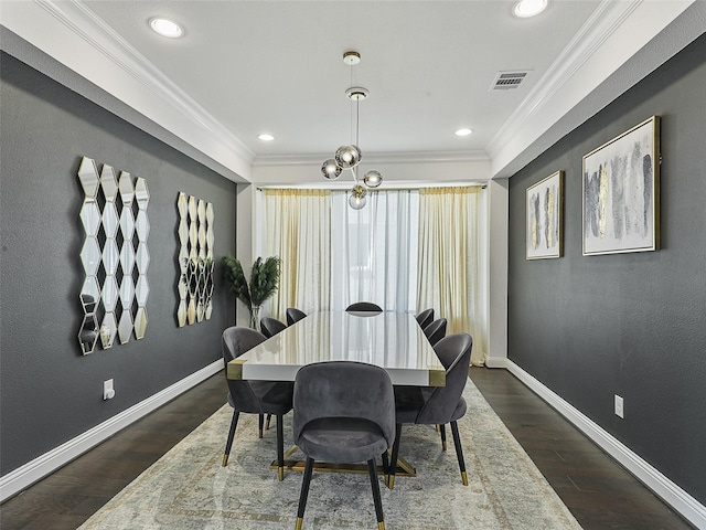 3141 Sunfish St, Prosper, TX 75078 - dining area featuring dark wood finished floors, baseboards, visible vents, recessed lighting, and crown molding