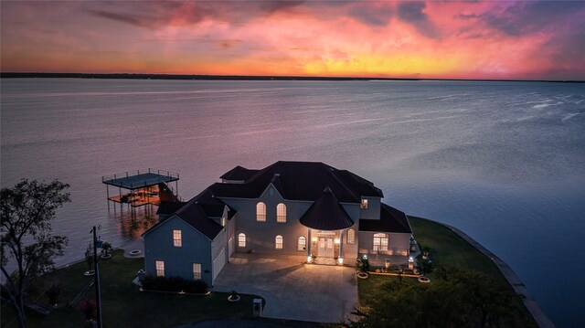 241 Loon Bay Dr, Gun Barrel City, TX 75156 - aerial view at dusk featuring a water view