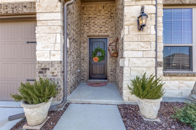 entrance to property with stone siding