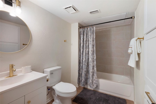 bathroom featuring visible vents, shower / tub combo, toilet, and vanity