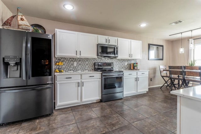 kitchen featuring visible vents, light countertops, appliances with stainless steel finishes, and white cabinets