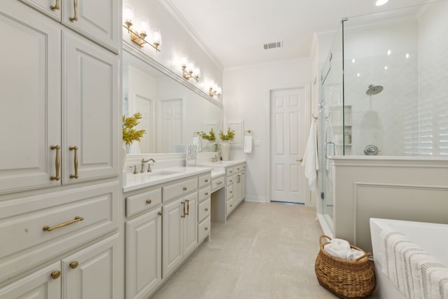 full bath with visible vents, a stall shower, crown molding, and a sink