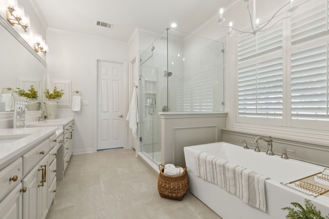 full bathroom featuring visible vents, a shower stall, crown molding, double vanity, and a soaking tub