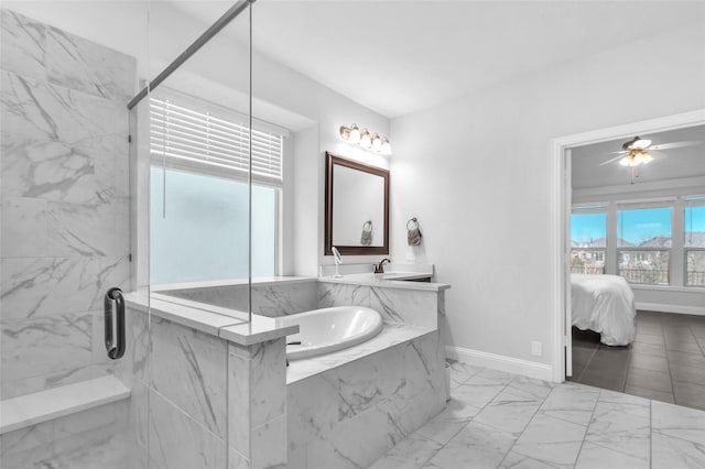 1411 Fishergate Dr, Forney, TX 75126 - ensuite bathroom featuring a marble finish shower, ceiling fan, a tub with marble appearance, marble finish flooring, and baseboards