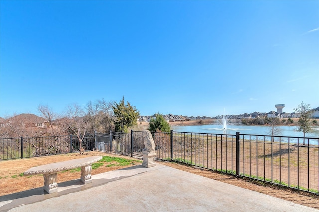1411 Fishergate Dr, Forney, TX 75126 - view of patio / terrace with a water view
