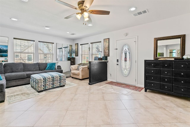 entryway featuring light tile patterned flooring, visible vents, recessed lighting, and a ceiling fan