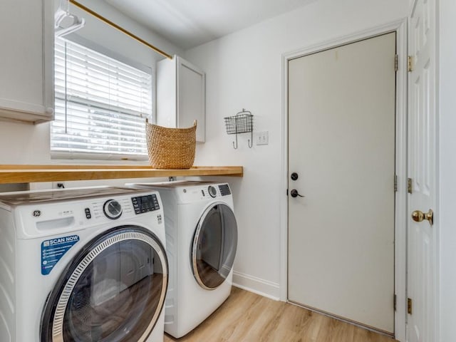206 Cocopa Dr, Lake Kiowa, TX 76240 - laundry area featuring washer and clothes dryer, cabinet space, light wood finished floors, and baseboards