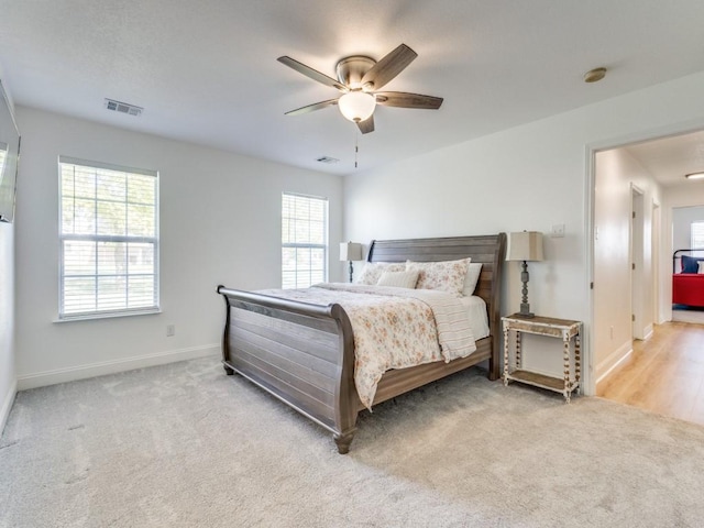 206 Cocopa Dr, Lake Kiowa, TX 76240 - bedroom featuring multiple windows, baseboards, carpet floors, and ceiling fan
