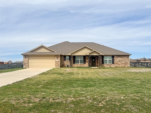 ranch-style home featuring fence, driveway, a front lawn, a garage, and brick siding