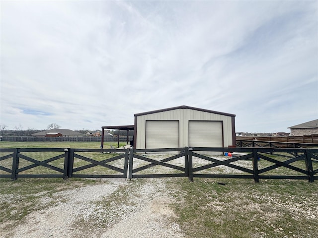 detached garage with fence