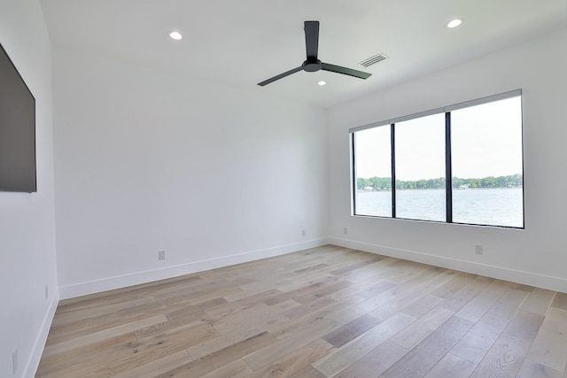 1733 E Lake Dr, Weatherford, TX 76087 - unfurnished room featuring recessed lighting, baseboards, ceiling fan, and light wood finished floors