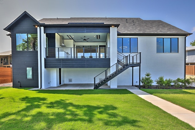 1733 E Lake Dr, Weatherford, TX 76087 - back of property with ceiling fan, stairs, roof with shingles, a lawn, and a patio