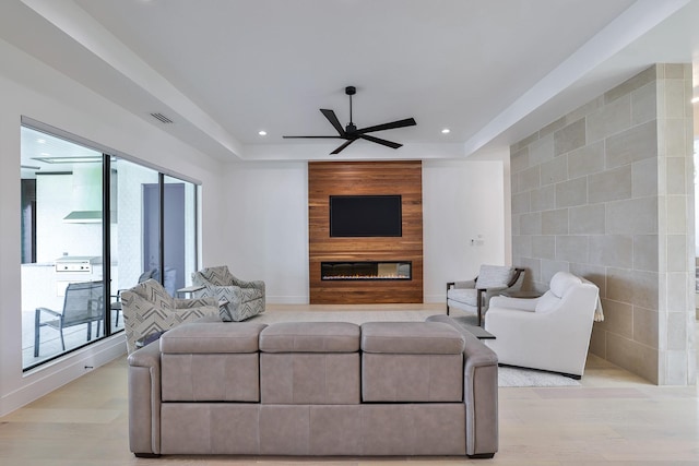 1733 E Lake Dr, Weatherford, TX 76087 - living area with a ceiling fan, recessed lighting, a fireplace, and visible vents