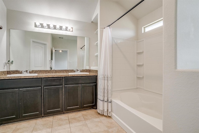 full bath with a sink, double vanity, shower / tub combo, and tile patterned floors