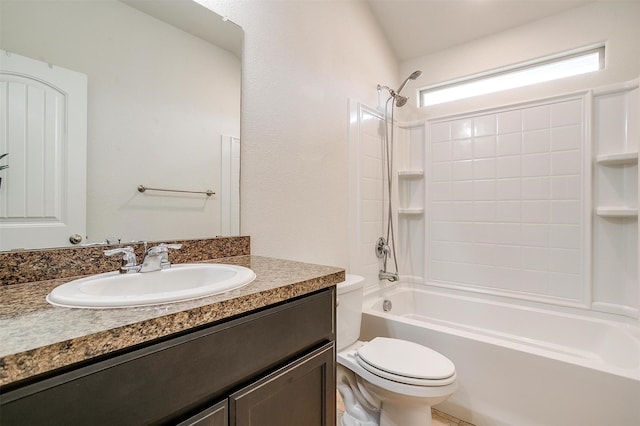 bathroom with washtub / shower combination, toilet, and vanity