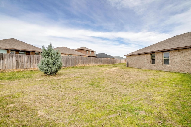 view of yard featuring a fenced backyard