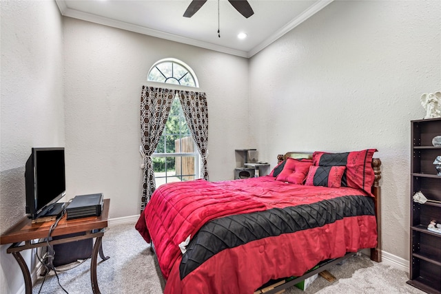 carpeted bedroom featuring multiple windows, crown molding, and baseboards