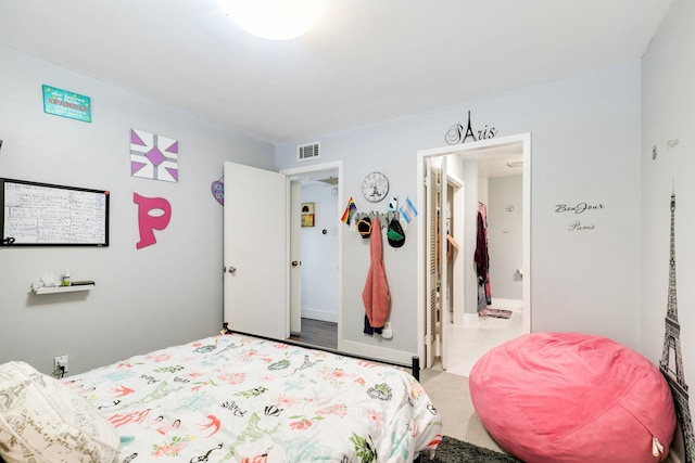 bedroom featuring visible vents