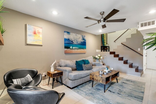 tiled living area featuring recessed lighting, visible vents, ceiling fan, and stairs