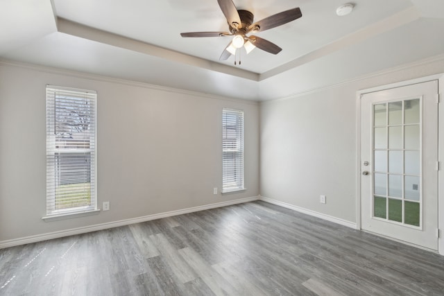 4018 Tobin Trl, Rowlett, TX 75088 - unfurnished room with plenty of natural light and wood finished floors