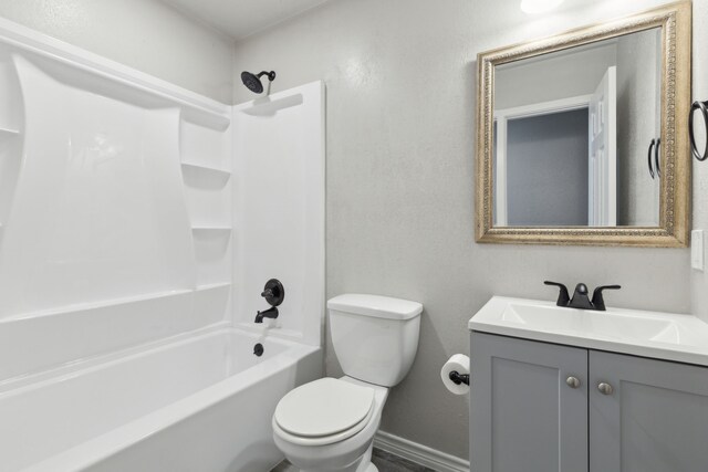 4018 Tobin Trl, Rowlett, TX 75088 - bathroom featuring toilet, vanity, shower / tub combination, baseboards, and a textured wall