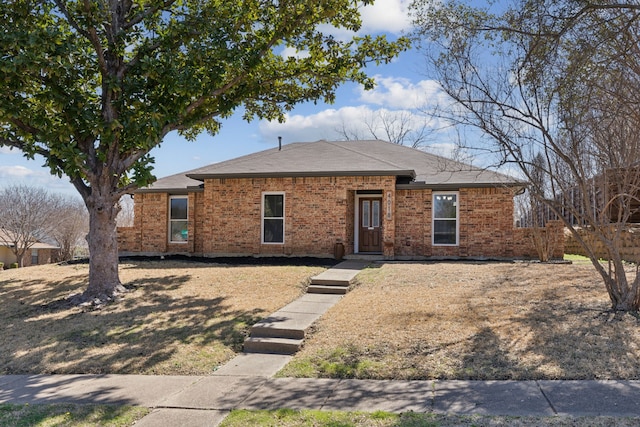 4018 Tobin Trl, Rowlett, TX 75088 - view of front of home with brick siding and a shingled roof