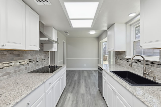 4018 Tobin Trl, Rowlett, TX 75088 - kitchen featuring a sink, black electric cooktop, tasteful backsplash, dishwasher, and baseboards