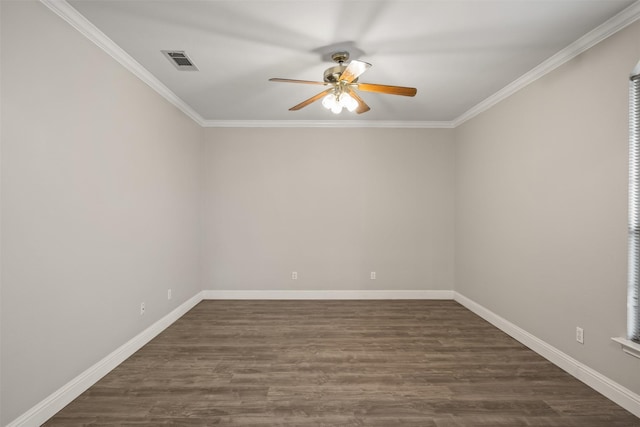 spare room featuring crown molding, visible vents, ceiling fan, and dark wood-style flooring