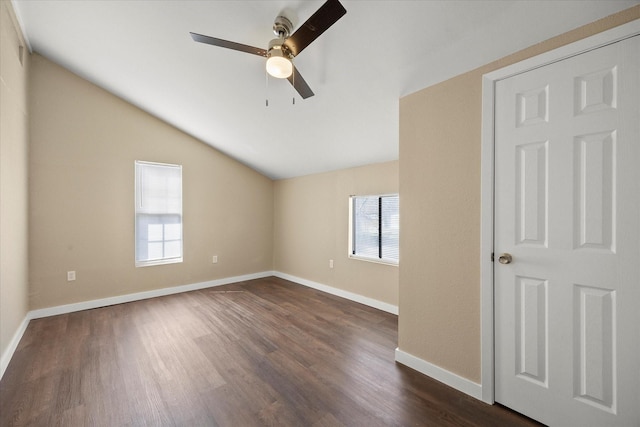 399 E College St, Alba, TX 75410 - empty room with dark wood-type flooring, baseboards, vaulted ceiling, and a ceiling fan