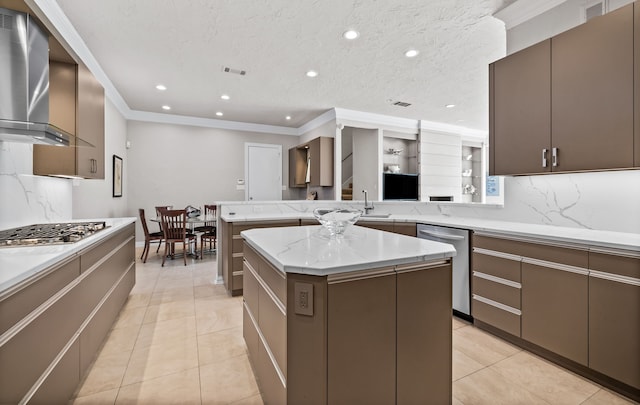 kitchen with light tile patterned floors, appliances with stainless steel finishes, and tasteful backsplash