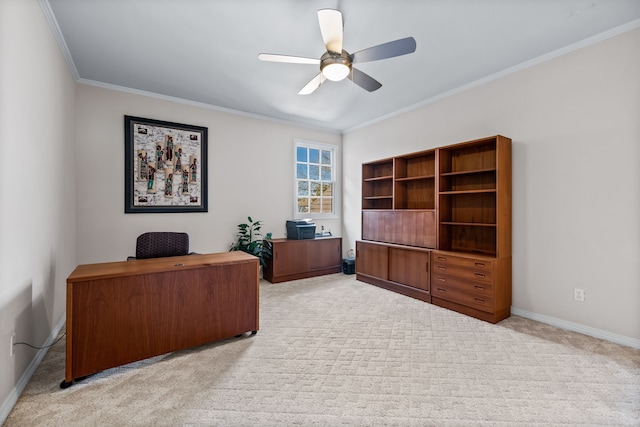 office with crown molding, ceiling fan, light colored carpet, and baseboards
