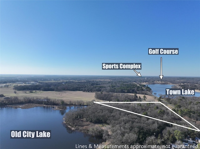 2431 N Jefferson, Mount Pleasant, TX 75455 - aerial overview of property's location featuring a nearby body of water and property parcel outlined