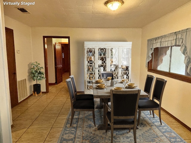 2431 N Jefferson, Mount Pleasant, TX 75455 - dining space with plenty of natural light, baseboards, and light tile patterned flooring